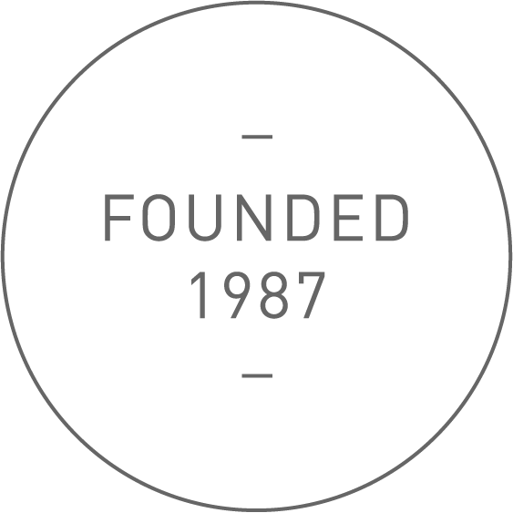 Stamp reading 'founded 1987'